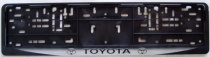 Рамка номерного знака с защелкой черная/серебро TOYOTA рельеф